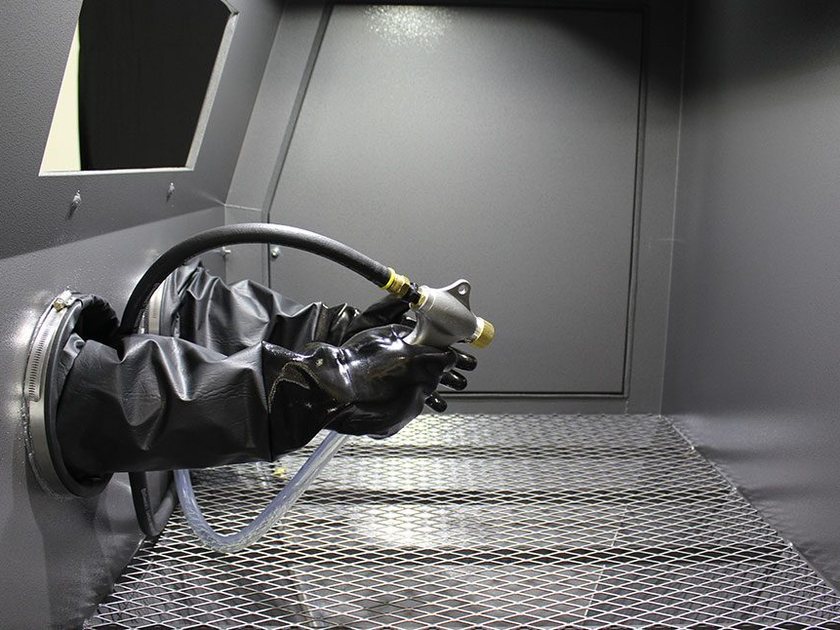 Interior of an abrasive blast cabinet